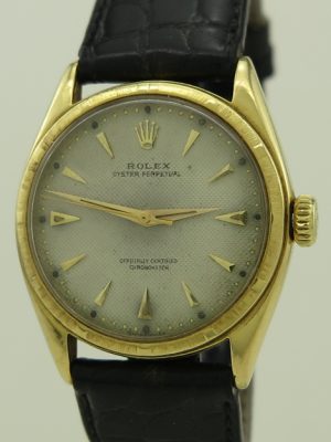 Rolex ref 6085 18k Yellow Gold Auto 34mm Cream Dial Oyster Perpetual Bubbleback in Fine Original Vintage Condition from the Early 1950s